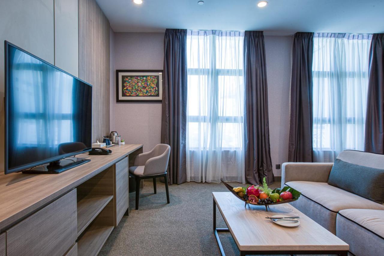 Mercure Living Putrajaya Exterior foto A living room in a serviced apartment in Moscow, Russia